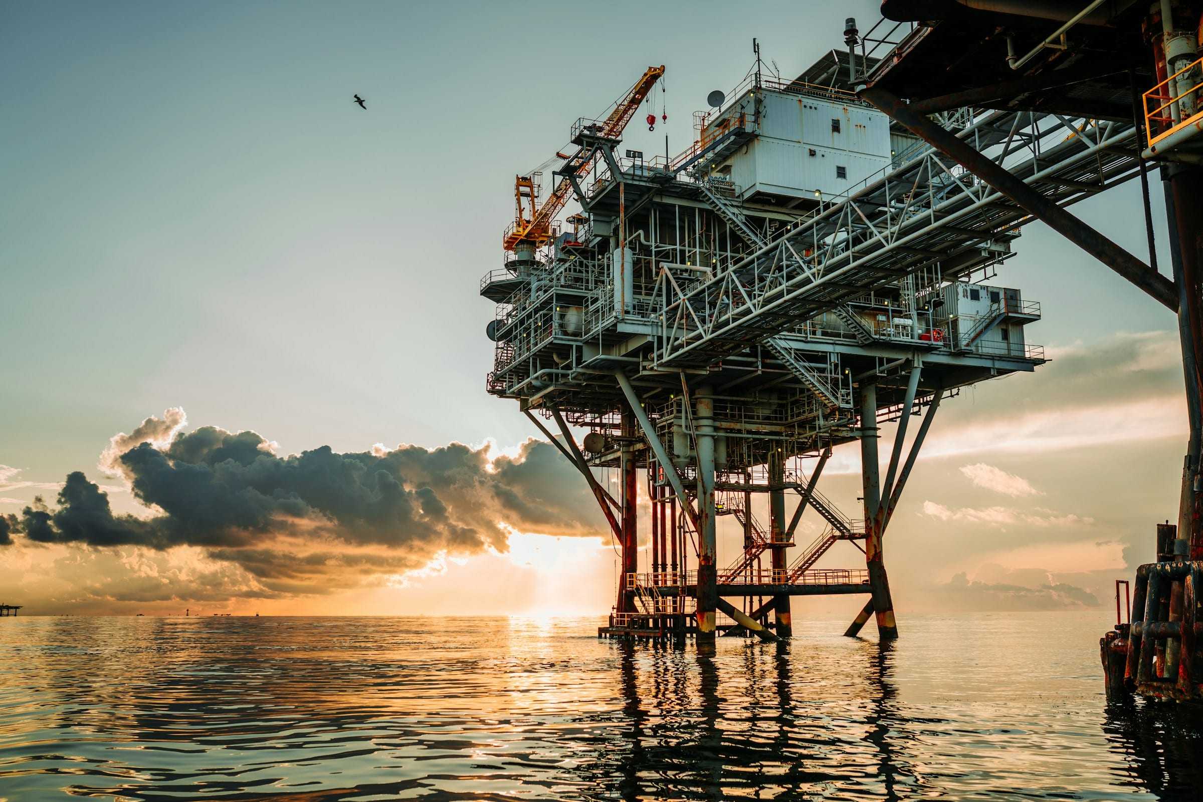Offshore gas platform at dusk